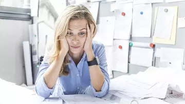Stress Looking Lady at Desk